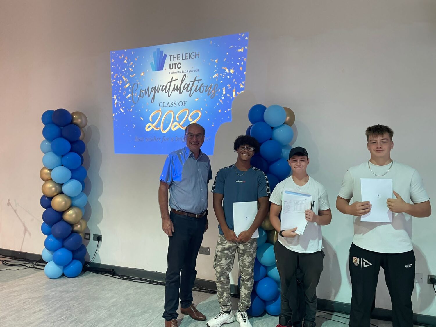 Students holding their results