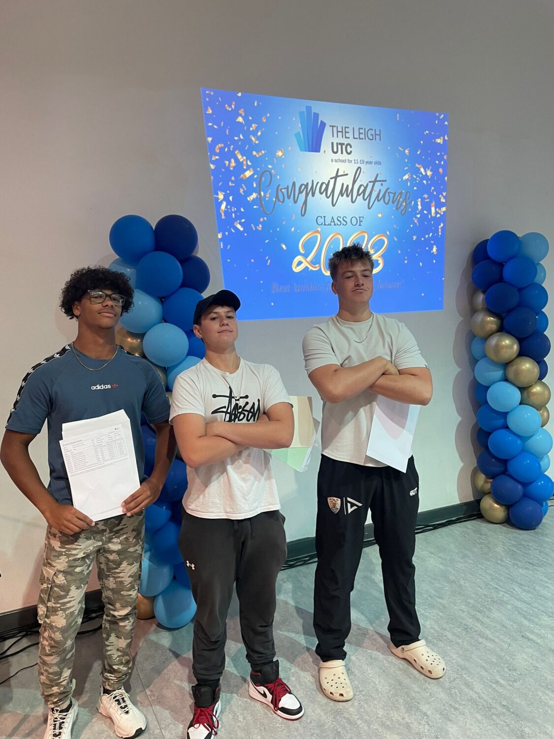 Students holding their results