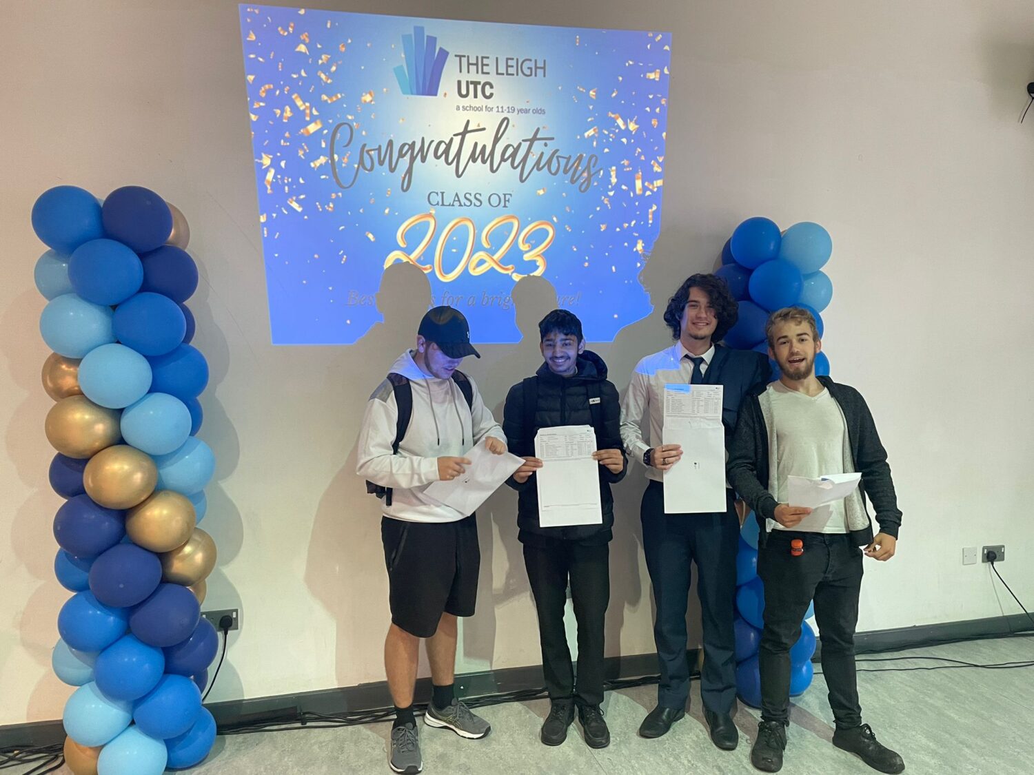 Students holding their results