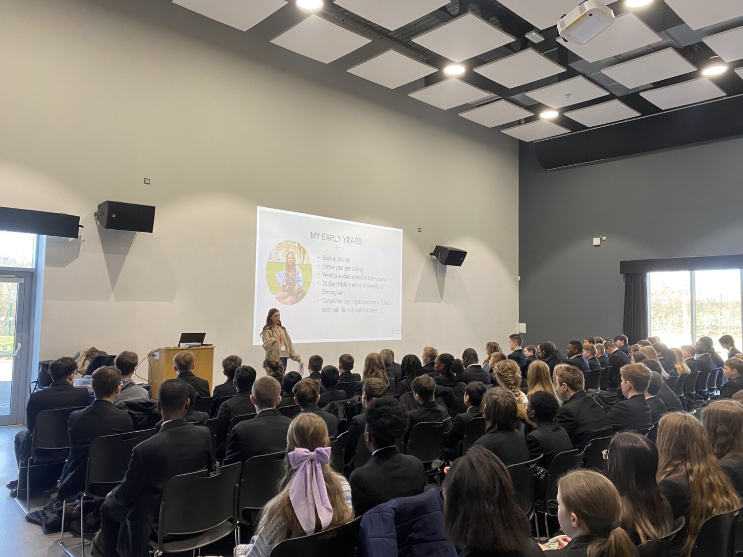 Students listening to a talk from an Author in a lecture hall